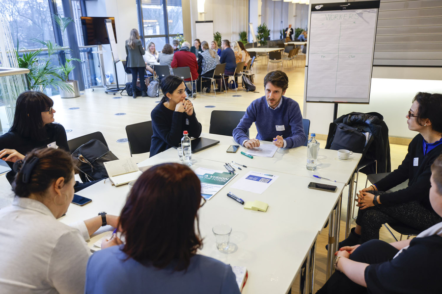 People discussing around a table