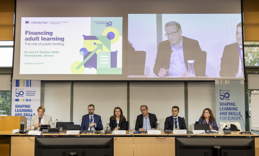 Group of people speaking from a panel