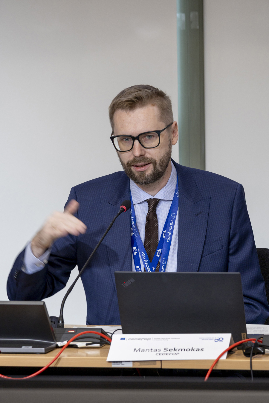 Man speaking from a panel