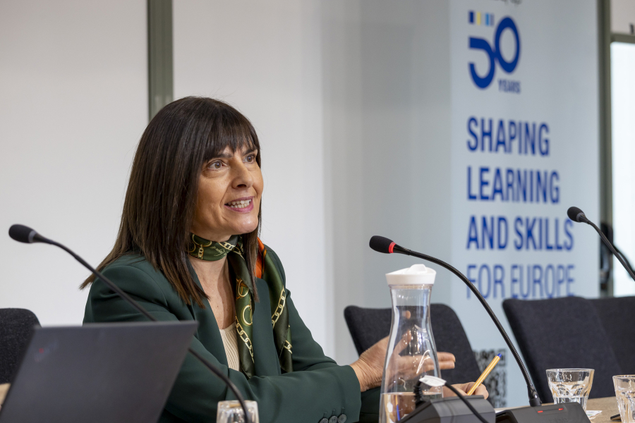 Woman speaking from a panel