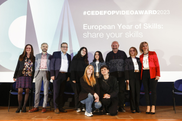 4 men and 6 women posing in front of the camera, in the background #CedefopVideoAward 2023, European Year of Skills:share your skills